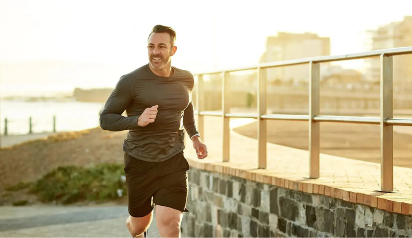 smiling man running